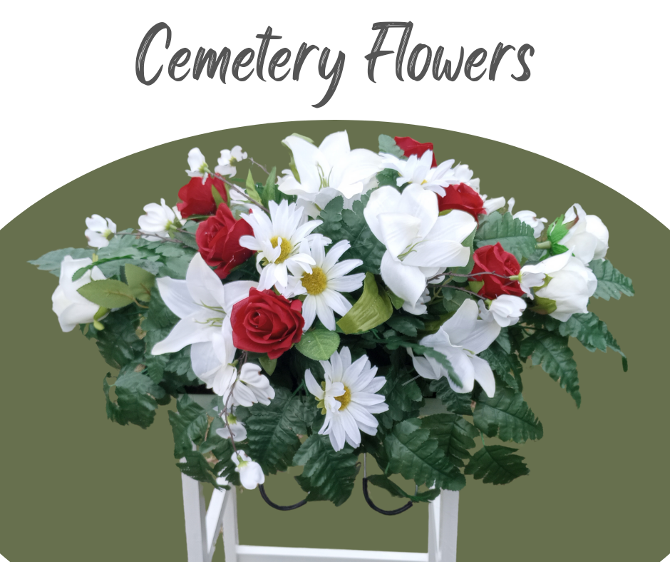 Cemetery Flowers daisies, lilies and roses on metal headstone saddle for top of stone.